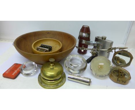 A brass Bell's Scotch whisky Presidential Year 1986 desk bell, a reproduction brass compass, a hip flask, a travel drinks set