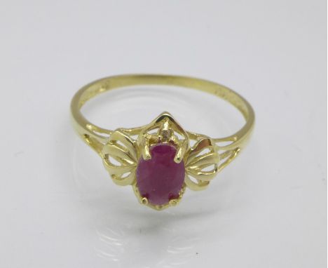 A 9ct gold, ruby and diamond ring, 1.9g, O