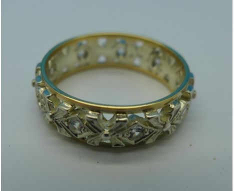 A 9ct gold, silver and white stone eternity ring, M