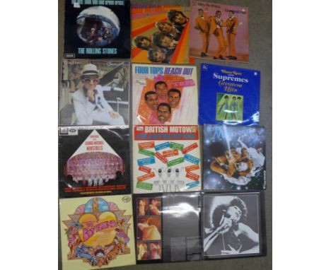 Eleven LP records including Boney M and Elton John