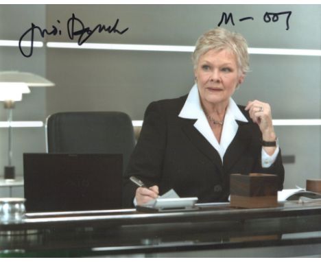 007 James Bond actress Dame Judi Dench signed 8x10 photo. Very unusually, she has also added "M - 007". Good condition Est.