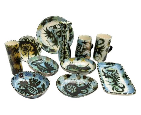 20th century Celtic Pottery, Newlyn, figure of a stylised cat, together with various vases, cups, mugs, ovoid shape dishes, o