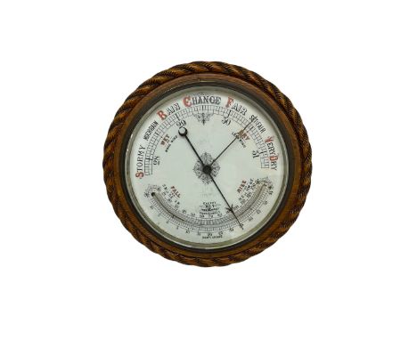 1930's aneroid barometer with a 10� porcelain dial recording barometric air pressure from 28 to 31 inches with weather predic