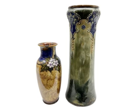 Doulton Lambeth Art Nouveau stoneware vase of tapering form, decorated with typical foliate stylised motifs upon merging blue