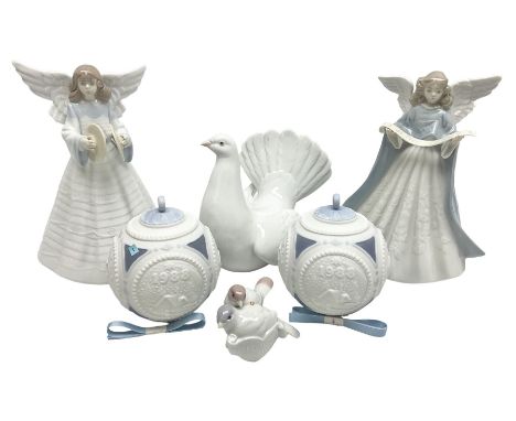 Four Lladro figures, comprising Angelic Cymbalist no 5876, Angel Tree Topper no 5875, Peaceful Dove no 6289 and First Christm