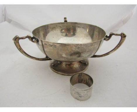 A silver Arts and Crafts trophy, bowl with inscription Zunceru Race Club and a napkin ring