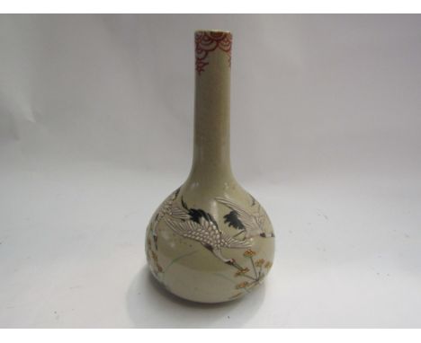 A Japanese ceramic vase, decorated with cranes, 19cm tall
