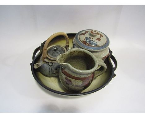 A large studio pottery bowl together with a jug, teapot and lidded canister (4) 