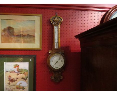 An early 20th Century oak barometer 