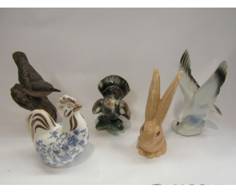 Five various ceramic and pottery figures including Poole, Minton and Sylvac bunny