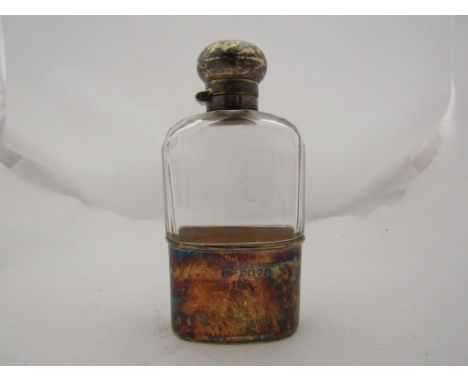 A Walker &amp; Hall silver and glass hip flask, London 1909 