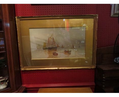A mahogany framed circular print after W. Hansom depicting girl at beach, and a gilt framed and glazed watercolour of boats, 