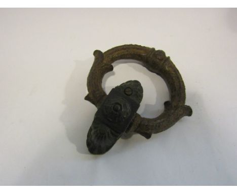 A cast circular door knocker 