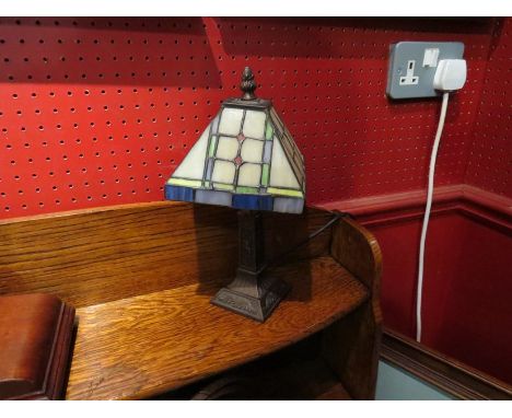 A small Tiffany style lamp
