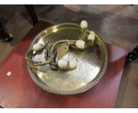 Three gilt brass and porcelain antique coat hooks and a brass tazza advertising Wright &amp; Sons biscuits and cakes 
