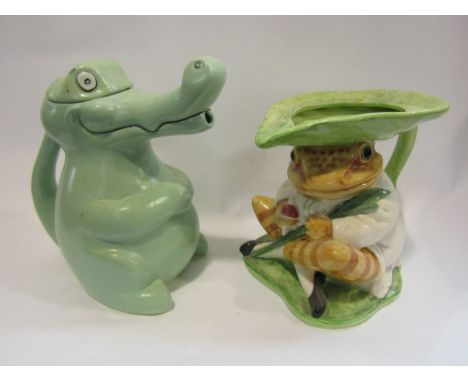 A Beatrix Potter jug and Carlton Ware crocodile teapot