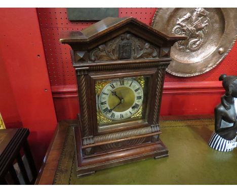 A table cuckoo clock, 11½"w x 16"h. Junghans movement, circa 1890-1900. Cuckoos on hour and half hour, strikes on a coiled go