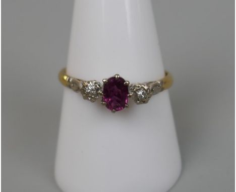 18ct gold ruby &amp; diamond 3 stone ring - Size: R.&nbsp;The weight of this ring is approximately 2.8g. The ruby is approxim