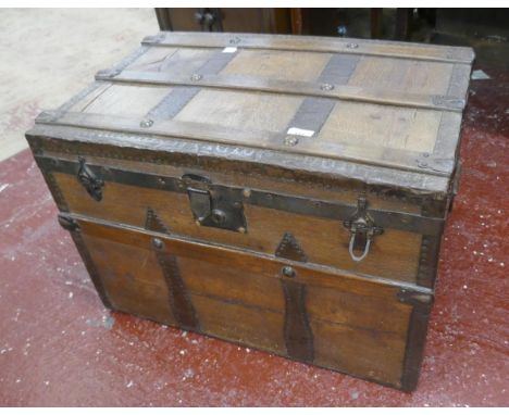 Antique metal bounded travel trunk 