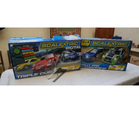 Scalextric Digital Triple Cut set together with Rally Pro Championship set 