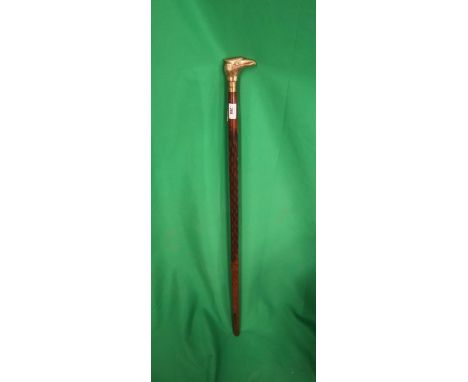 Walking stick with brass eagle head 