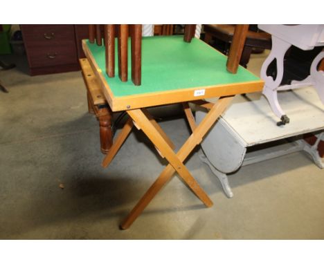 A folding card table