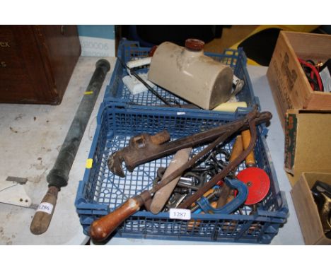 Two boxes containing small G clamps, stoneware hot water bottle, a flat iron and various other tools