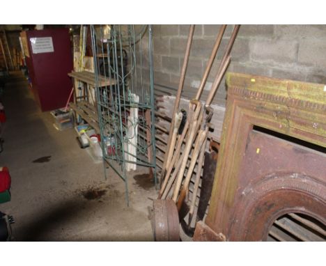 A quantity of long handled gardening tools