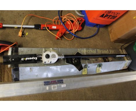 A Universal band fit chainsaw attachment