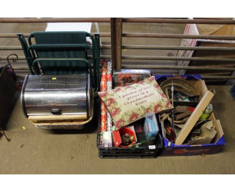 A stainless steel bread bin, a folding chair and two boxes of various tools and sundry items