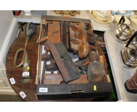 A box of moulding planes and other woodworking tools