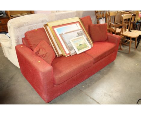 A John Lewis red upholstered sofa bed