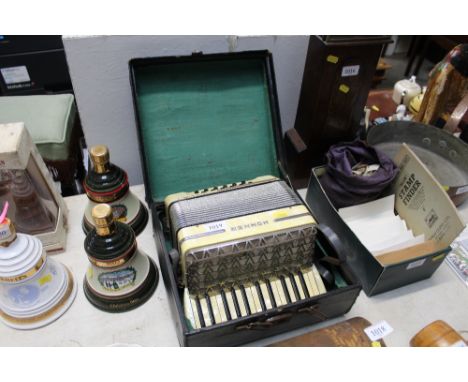 A Horner Imperial accordion in fitted case