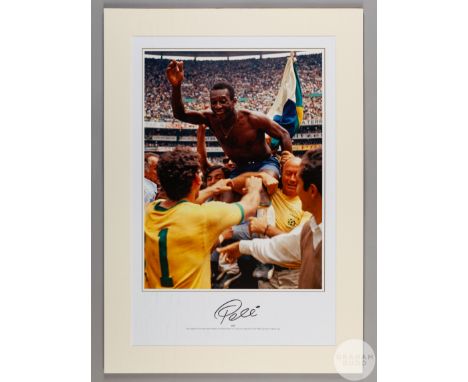 A large colour photographic print of Pele following Brazil's victory over Italy in the 1970 World Cup Final,
signed on the fr