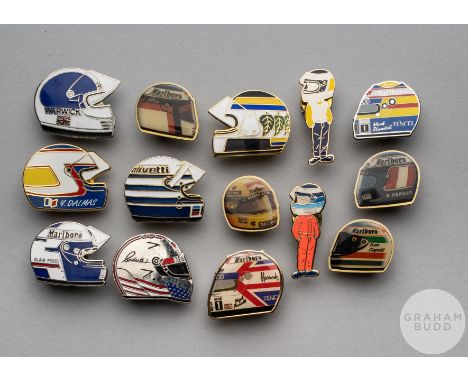 Twelve various enamel F1 lapel badges formed as racing helmets,&nbsp;
including examples for Alain Prost, Gerhard Berger, Der