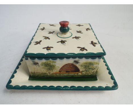 Wemyss honey box and cover, signed and impressed - base measures 18.5cm square      Condition - thistle finial has been glued
