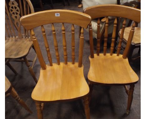 Pair of light beech stick back windsor dining chairs 