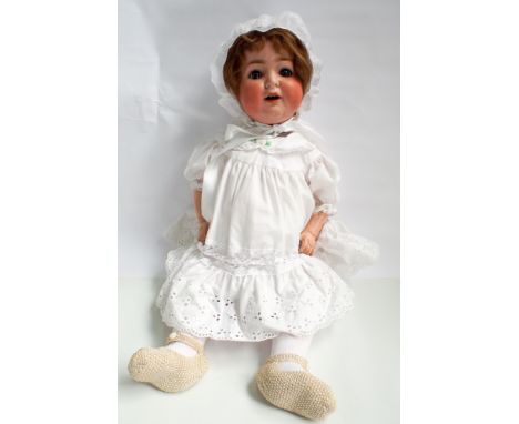 German bisque head doll, head inscribed Burggrub numbered 169-7 Germany composition jointed body.  Height 64cm