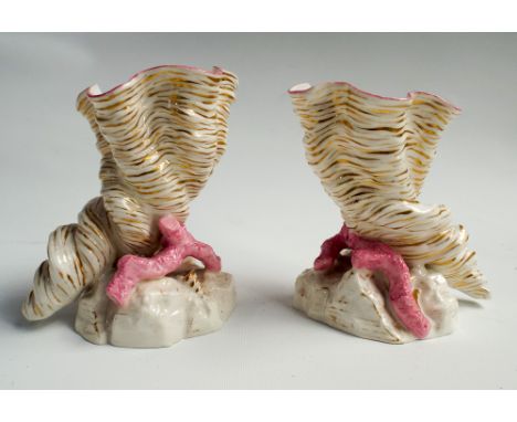 Pair of Royal Worcester Cornucopia shell posy vases on seaweed naturalistic modelled bases .  Height 10cm 