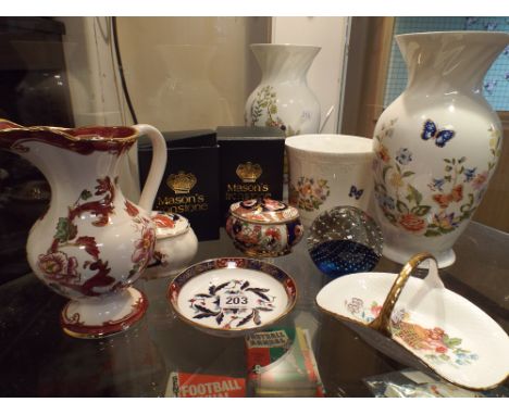 A collection of Masons iron stone, trinket jars, jugs, Aynsley cottage garden vases and a Caithness paperweight 