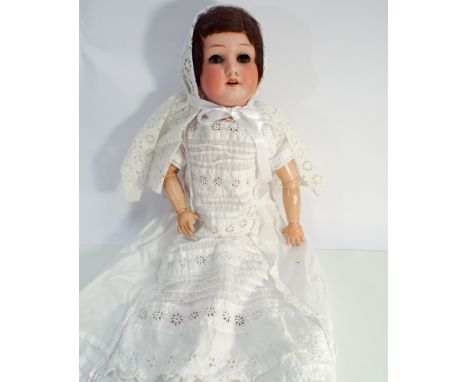 Heubach and Koppelsdorf German bisque head doll with composition body, head numbered 250.3.  60cm tall      Condition - one l