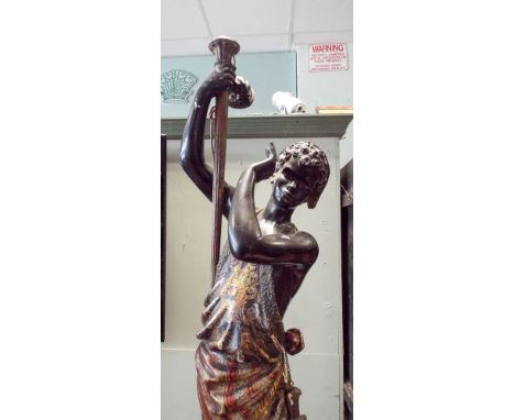 A 19th century boy black and lacquered Blackamoor figure made into a lamp with stand some damage 82" high  