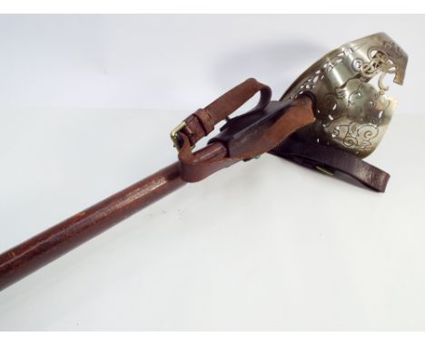 George V army officers sword, in leather scabbard (grip guard damaged)