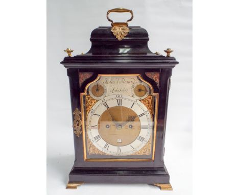 Mid 18th century striking bracket clock by Justin Vulliamy London with brass and silver dial in ebony gilt mounted case 17" h