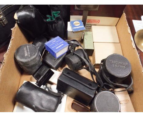 Assorted telephoto and other camera lenses, reflector lamp, flashlights etc. 