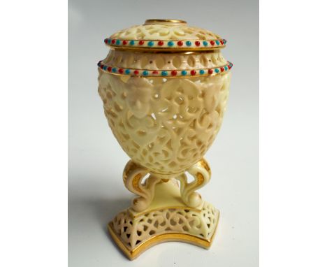 Royal China Works Worcester reticulated urn shaped vase and cover on a tri form base, numbered 307.  Height 13cm      Conditi