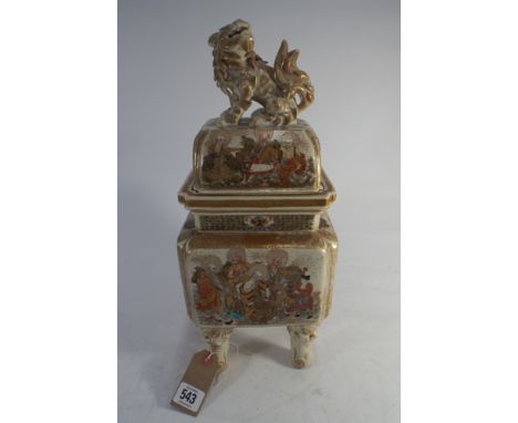 Japanese Satsuma square bodied vase and cover, the vase lifted on stylised mask feet, the lid with dog of fo finial.  Height 