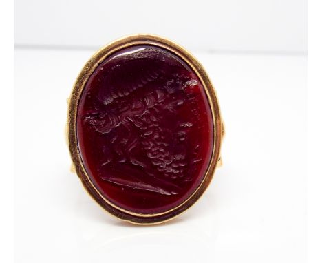 Large antique intaglio carved ring - approx 2.6cm x 2.2cms x 0.3cms high     Condition - panel has a crack and a chip to the 