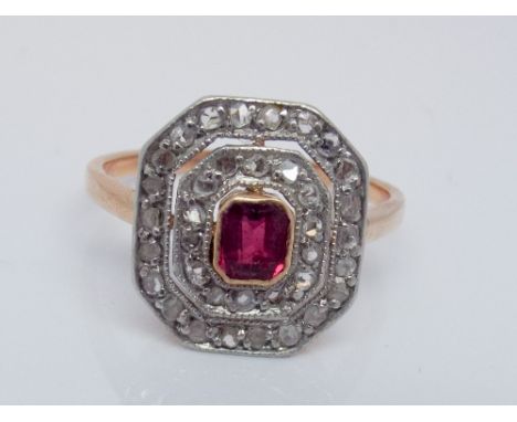 Edwardian synthetic ruby and diamond cluster ring set in a plaque design on an unmarked rose gold shank ring size P