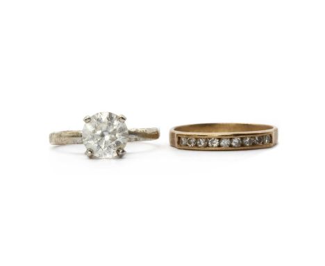 Two gold rings, comprising a white gold single stone cubic zirconia ring, tested as approximately 9ct gold, ignore markings, 